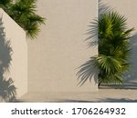 Bright white wall with green tropical leaves, sunlight with shadows. Summer, spring background. 3d rendering.