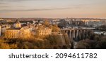 Small photo of Luxembourg City - December 16, 2021 - aerial panoramic sunset view of downtown Luxembourg with the old viaduct