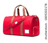 Small photo of Red Duffle Bag Isolated on White Background. Front Side View Luggage Handbag. Foldable Striped Travel Bag with Top Closure and Zippered Compartment