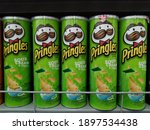 pringles logo  chips cans at... | Shutterstock . vector #1897534438