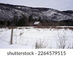 Old Barn With A Snow Covered...