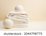 Wool Dryer Balls On White Towel ...