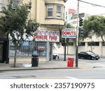 Small photo of 2799 16th St, San Francisco, CA 94103, USA September 4, 2023 Jim Georgie's Donuts photographed from the front.