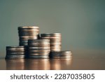 close-up of the coins stack for a financial business presentation background, home loan, money saving, stock and fund management, retirement plan concept, business growth, profit, selective focus