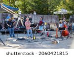 Small photo of Athens, Georgia - October 10, 2021: Klezmer Local 42 plays at the Jittery Joe's Roaster during the Boo-Le-Bark fundraising event for AthensPets, an area nonprofit.