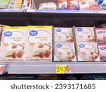 Small photo of Los Angeles, California, United States - 09-30-2023: A view of several packages of Great Value unflavored gelatin, on display at a local Walmart.