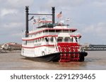 Small photo of Old Stern Wheeler Steam Boat in the Mississippi Rive at New Orleans