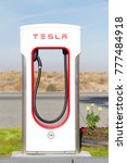 Small photo of Bakersfield, CA - December 18, 2017: Tesla Super Charging station on Stockdale Hwy and the 5 fwy. Tesla Supercharger stations allow Tesla cars to be fast-charged at the network within an hour.