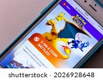 Small photo of Kumamoto, JAPAN - Aug 10 2021 : The official website of Pokemon Unite, multiplayer online battle arena video game developed by TiMi Studio Group for Android, iOS and Nintendo Switch, on iPhone