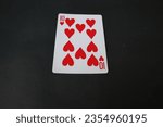 Small photo of ogan ilir,Indonesia-july 22th,2023: ten of heart. rummy isolate on black background. selective Focus image