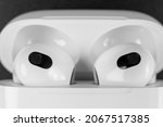 Air Pods 3. Air Pods 2021. with Wireless Charging Case. Magsafe. New Airpods on black background. Airpods 3. EarPods. 