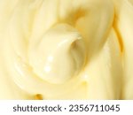 Small photo of Mayonnaise or mayo is a thick, cold, and creamy sauce commonly used on sandwiches, hamburgers, salads, and fried food. An emulsion of oil, egg yolk, and an acid, either vinegar or lemon juice.