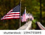 Row Of American Flags Along A...