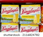 Small photo of Orlando, FL USA - September 10, 2021: Cases of Leinenkugel's Summer Shandy beer at a Sam's Club grocery store.