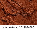 Natural cocoa powder textured background, copy space