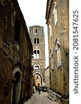 Small photo of CASERTAVECCHIA, ITALY - CIRCA APRIL 2019: Bell tower of St Michael's Cathedral in Casertavecchia. Built in 1234, it stands 32 meters above the square and has 5 floors adorned with mullioned windows