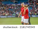 Small photo of OSLO, NORWAY - June 12th 2022: Erling Braut Haaland and Martin Odegaard celebrates Norway's 3-2 victory over Sweden