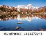 Grandes Jorasses, Mont Blanc massif, reflecting into the still waters of Lake Arpy, Aosta Valley