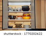 Small photo of Old vintage tableware in a rustic Cabinet. The concept of simplicity, asceticism and poverty