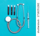 stethoscope and syringe.... | Shutterstock . vector #1718251282