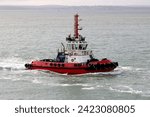Small photo of PORTSMOUTH, UK – FEB 3RD 2024: The SMS towage azimuth stern drive tug ENGLISHMAN in the Solent