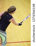 Female playing raquetball