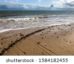 Small photo of Undercurrents of the ocean from the shore