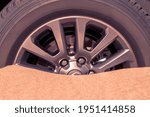 Close Up Of A Car Wheel Stuck...