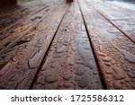   Drops Of Water On A Wooden...