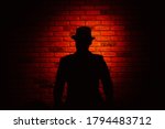Silhouette Of A Man In A Hat On ...