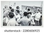 Small photo of Island Ischia, Italy June 1939 at a party, celebration. happy dancing people women with headscarf, kerchief and Man with Kufi, muslim skull cap. people with different origin. nostalgic vintage photo