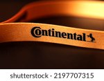 Small photo of Kaunas, Lithuania - July 2022: neck lanyards strap string of continental company on black background.