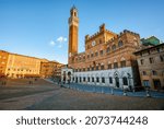 Historical Piazza del Campo square with Palazzo Vecchio palace in Siena Old town, Tuscany, Italy