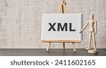 Small photo of There is wood block with the word XML. It is as an eye-catching image.