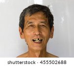 Smiling Asian Oldman With...