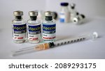 Small photo of Basic fomulars 3 step for anti covid-19 virus.first does,second dose and booster dose. Corona virus vaccine in glass bottle.Corona virus,mRNA type Vaccine.Viral Vector vaccine type.Inactivated Vaccine