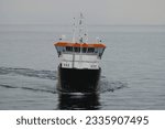 Small photo of Pilot vessel and tender boat while on duty during the pilot transfer operation. Maritime pilots safety. The risks associated with pilot transfer operations.
