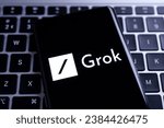 Small photo of Grok AI chatbot logo seen on smartphone screen. Grok X.ai is a new Chatbot for x platform (ex Twitter). Stafford, United Kingdom, November 5, 2023