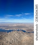 Small photo of Aerial view of rocky terrain and distant view of Lake Mead Las Vegas, Nevada