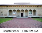 Small photo of OBERLIN, OHIO / USA - SEPTEMBER 7 2009: Front steps of the Allen Memorial Art Museum (AMAM), run by Oberlin College, contains over15,000 works of art. "The Cause of Art is the Cause of the People"