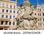 Small photo of Goerlitz, Saxony, Germany, 04 September 2021: Muschelminna or Mussel minna fountain at Postplatz, picturesque street, renaissance baroque historical buildings at summer day, sculptures of mermaids.