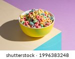 Cup With Cereals On A Colored...