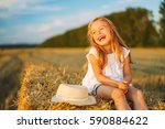Little Girl In A Field With Hay ...