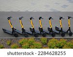 electric scooters in the parking lot