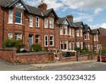 Small photo of York, North Yorkshire, UK. August 20, 2023. Row of terraced houses on Scarcroft Hill. Brick built with bay window and mock Tudor timbering