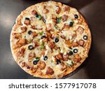 Small photo of Pizza-maniacs in Bangalore have good reason to munch their way around the city. After all, the city’s many pizzerias, fancy and humble, have made it their mission to send you into a blissful tizzy.