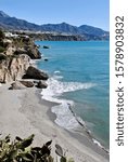 Small photo of Nerja, Spain - View from the Balcony of Europe (Balcon of Europa) on the Costa del Sol. Calahonda beach, the rocky outcrops, El Chorrillo beach and unobstructed views of the Maro-Cerro Gordo coastline