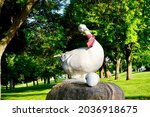 Small photo of New Ulm, Minnesota - 2021: Statue of Gertie the Goose in Riverside Park, a mascot for the Goosetown neighborhood in New Ulm, Minnesota. Goosetown was named for the geese the German immigrants kept.