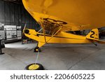 Small photo of Tuskegee, Alabama -2022: Piper Cub at Tuskegee Airmen National Historic Site. Piper J-2 Cub a small, yellow, tandem two-seater airplane, simple in design and operation.