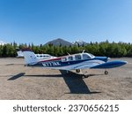 Small photo of Port Alsworth, Alaska -May 20, 2023: Beechcraft Bonanza six-seater, single-engined airplane. Lake Clark Air, Port Alsworth Airport with a dirt or gravel runway in Lake Clark National Park and Preserve